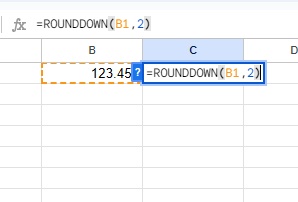 C1セルに「=ROUNDDOWN(B1,2)」と入力
