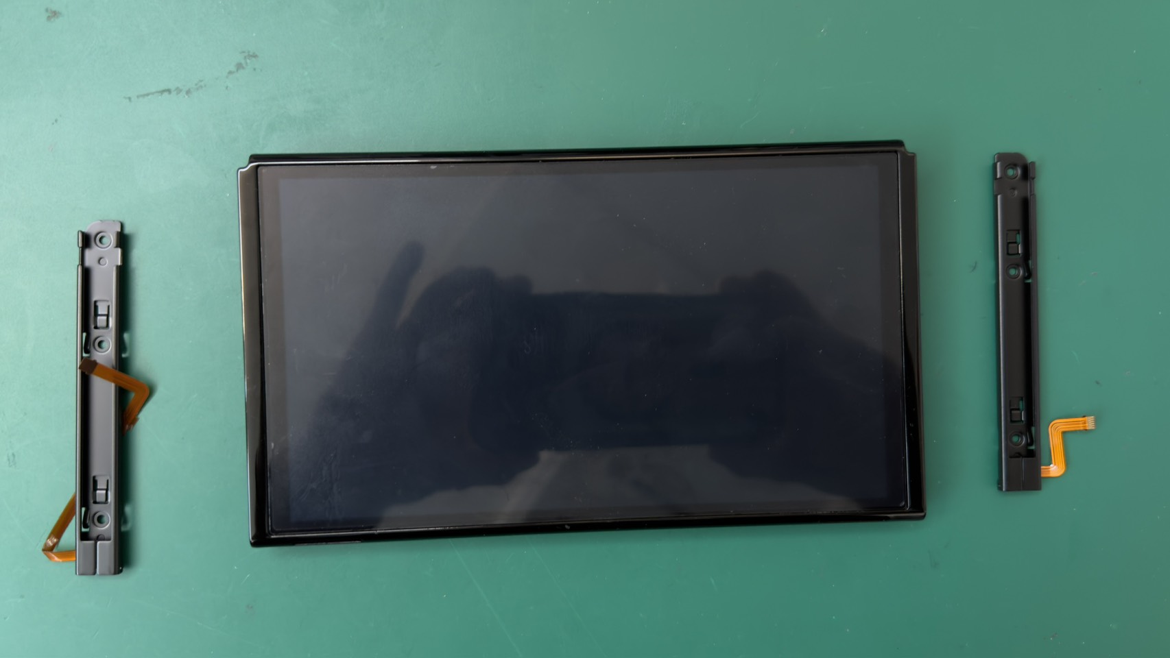 Nintendo switch（ニンテンドースイッチ）認識不良による本体側スライドレール交換修理【登戸・向ケ丘遊園店】