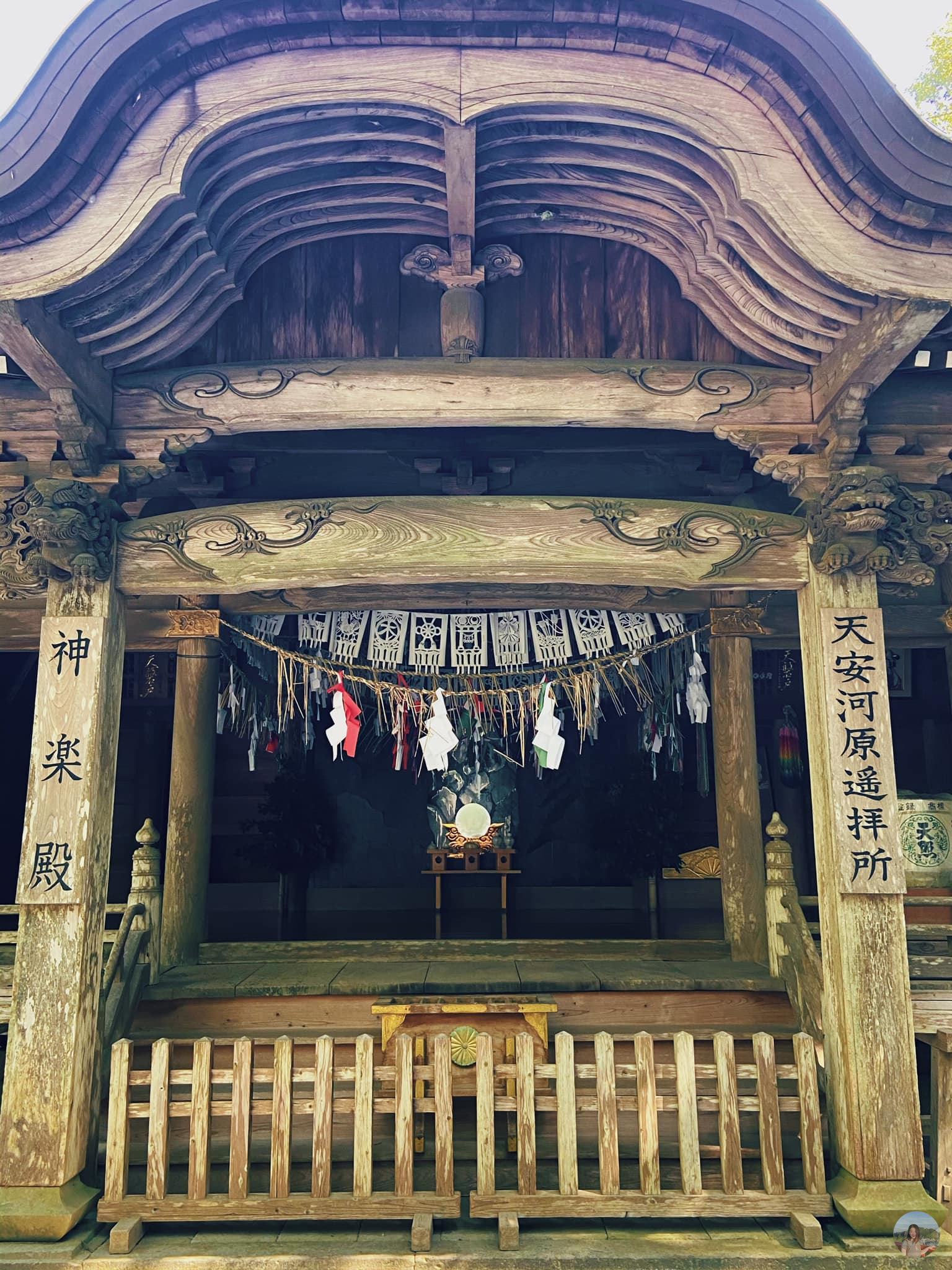The ancient and majestic Takachiho shrine with many carvings that bear the features of Shinto