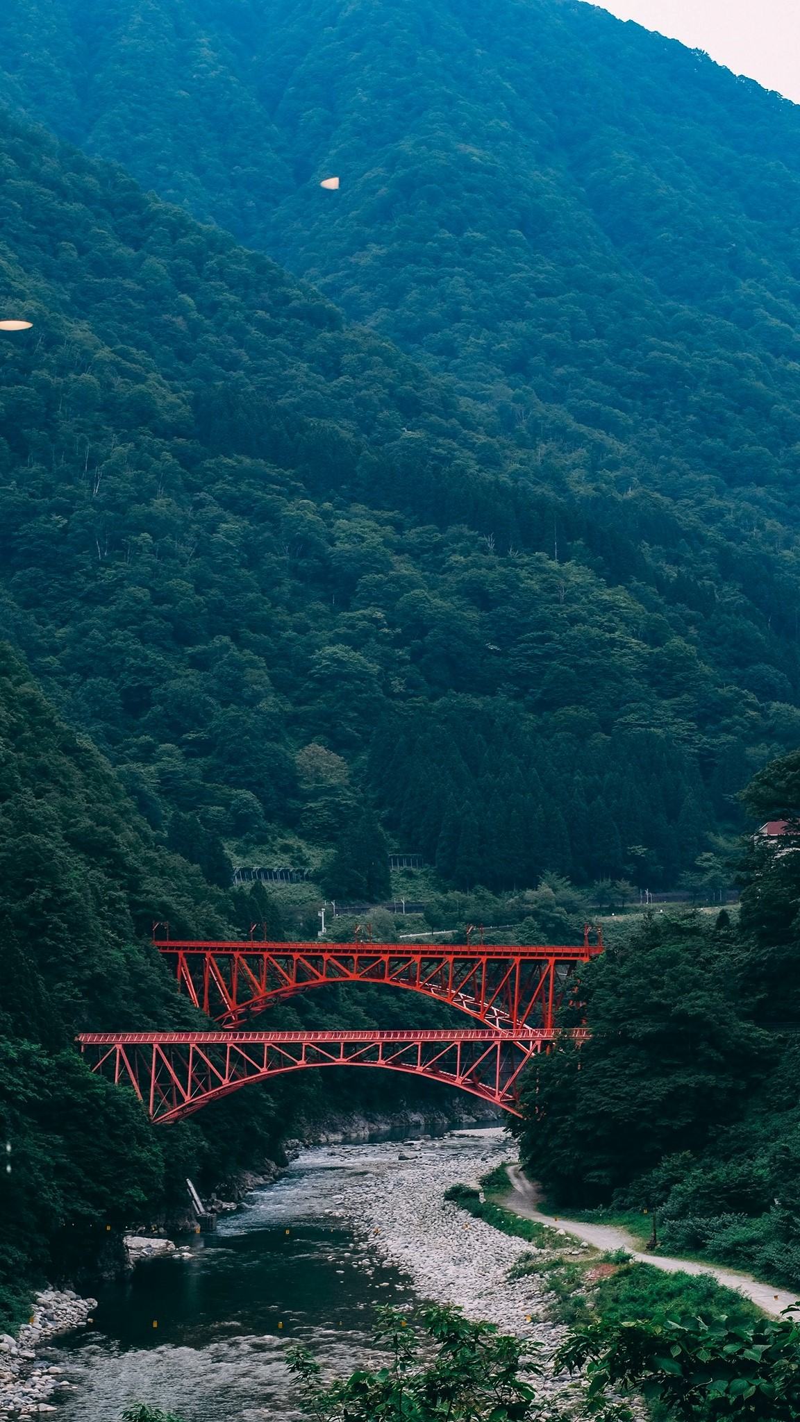 The Yamabiko bridge and Shin - Yamabiko bridge the distinctive red color in the gorge