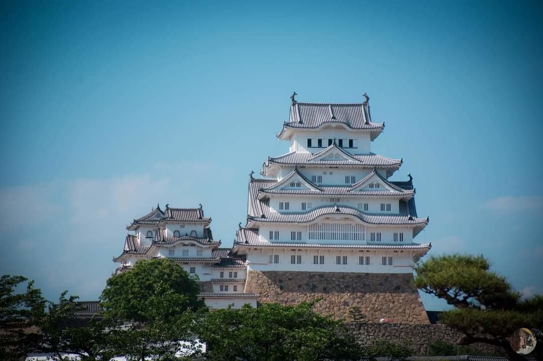 The attractive ancient beauty of the castle stands out against the blue sky.