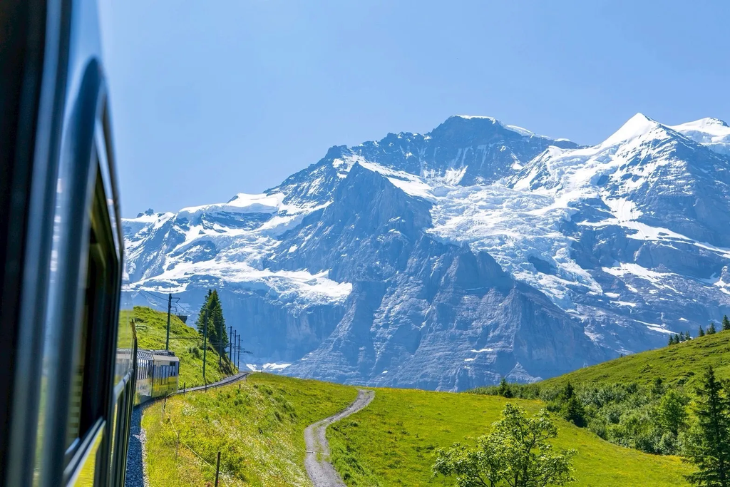 Window seat views heading to Kleine Scheidegg